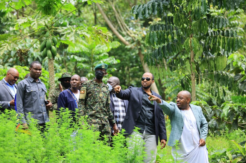 The Director Tooro Botanical Gardens Takes King Oyo an othe Officials through Environmental Conservation at Tooro Botanical